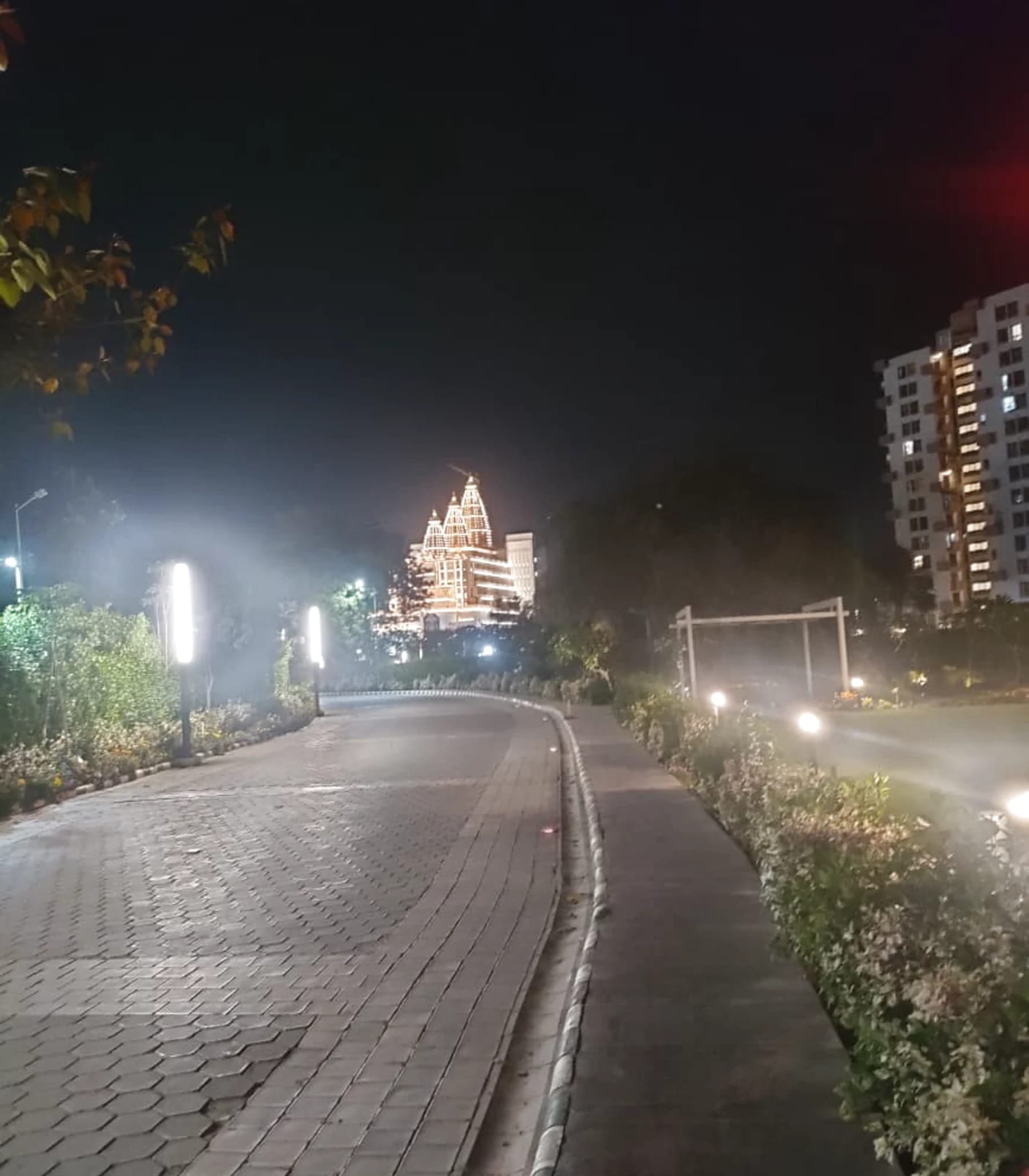 Illuminated Chandrodaya Mandir seen from the Krishna Bhumi campus